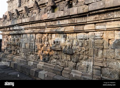 The Borobudur Relief Panels Illustrates Intricate Narrative Detail and Breathtaking Architectural Grandeur!